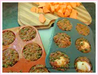 ground beef sauce in the muffin tray