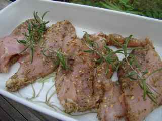 Chicken breasts marinading prior to broiling