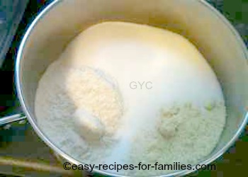 Flour sugar and almond meal in a large pot