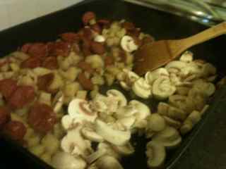 Cook mushrooms separately by moving the cooked potatoes to the side