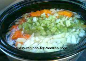 Here are the ingredients in the slow cooker to make the easy pumpkin soup