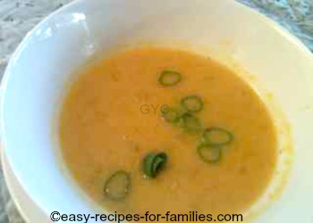 Easy Pumpkin Soup In A Bowl Garnished With Chives