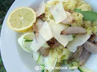 A serving of delicious easy risotto with caramelized eschalots and freshly shaved Parmesan cheese.