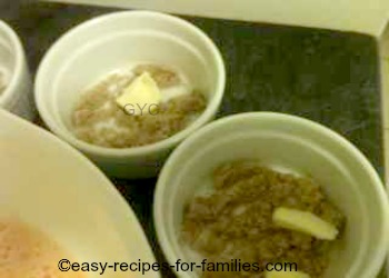 Easy Egg Custard Recipe - butter and sugar in each ramekin 