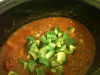 Stir through green peppers into this easy pumpkin chili just prior to serving