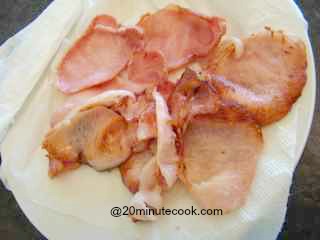 Drain cooked bacon on paper towels