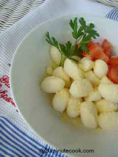 Gnocchi cooked to perfection served with grated parmesan cheese