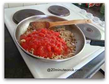 Add in canned tomatoes