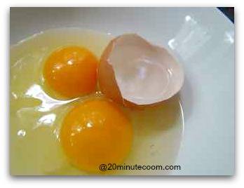 Break eggs into a bowl with 1/2 egg shell of water