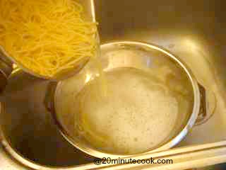 Drain spaghetti into the colander