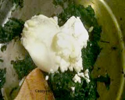Add ricotta and fetta cheese to the spinach 