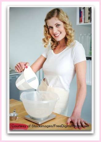 lady in kitchen showing how do you cook...?