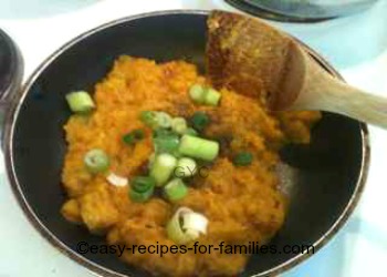 For the pumpkin appetizer, start by adding pumpkin to the fried garlic