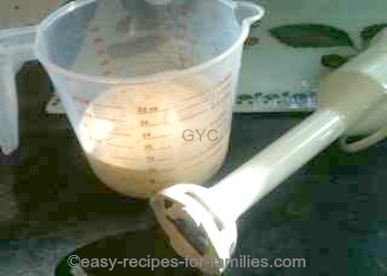 Jug of cream measured to 2 cups