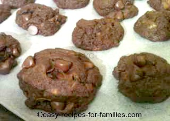 A tray of freshly baked pumpkin chocolate chip cookies