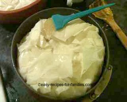 Fold filo sheets over and wrap up the pie