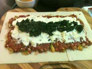 Layer ingredients of meat mixture, cheese and spinach on the pastry for this recipe for ground beef