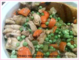 chicken pot pie filling in a casserole dish