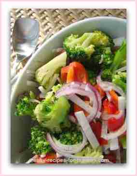 Cold Broccoli Salad With Red Bell Peppers, Radish, Spanish Onion Dressed With An Asian Inspired Marinade.