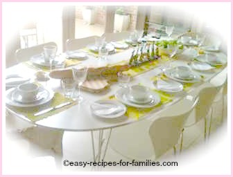 A table beautifully set for an elegant dinner party menu for twelve