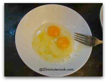 Two eggs ready to be beaten