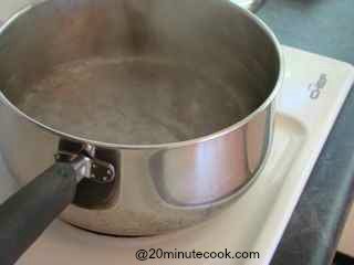Water at a rapid boil to cook gnocchi