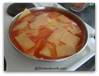 Add water and broken pieces of lasagne