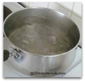 Water in a saucepan at rapid boil