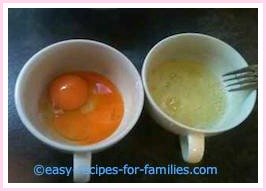 separated eggs in two bowls