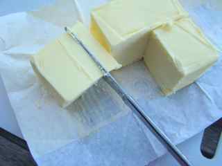 Cut butter into the required portion