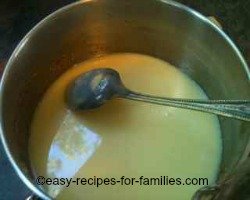 Pour condensed milk into a roomy mixing bowl