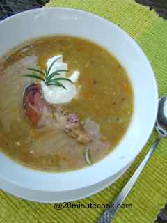 Split pea and ham soup served with chunks of ham on the bone and a generous dollop of greek yoghurt