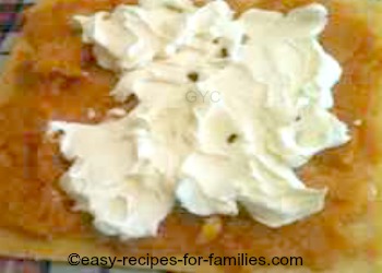 Pumpkin cake roll with spread of pumpkin and cream