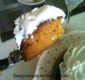 Pumpkin Cake made from easy pumpkin cake recipes, with a thick layer of white frosting