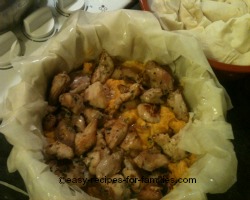 Spoon chicken into the filling 